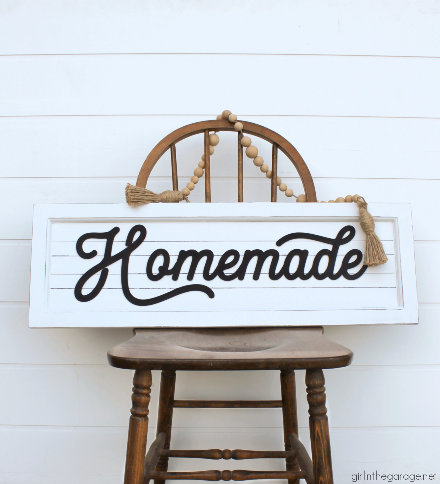 How to transform and repurpose old Goodwill art into a beautiful farmhouse-style sign for your home. Easy home decor ideas by Girl in the Garage
