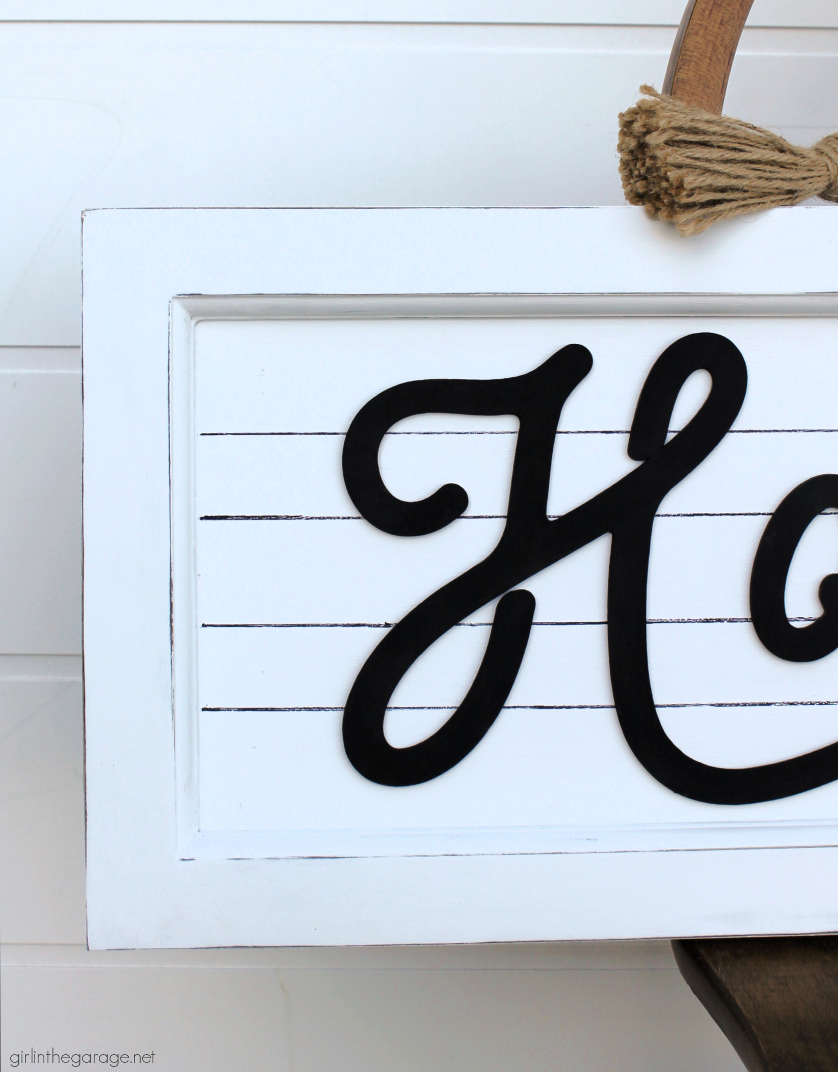 How to transform and repurpose old Goodwill art into a beautiful farmhouse-style sign for your home. Easy home decor ideas by Girl in the Garage