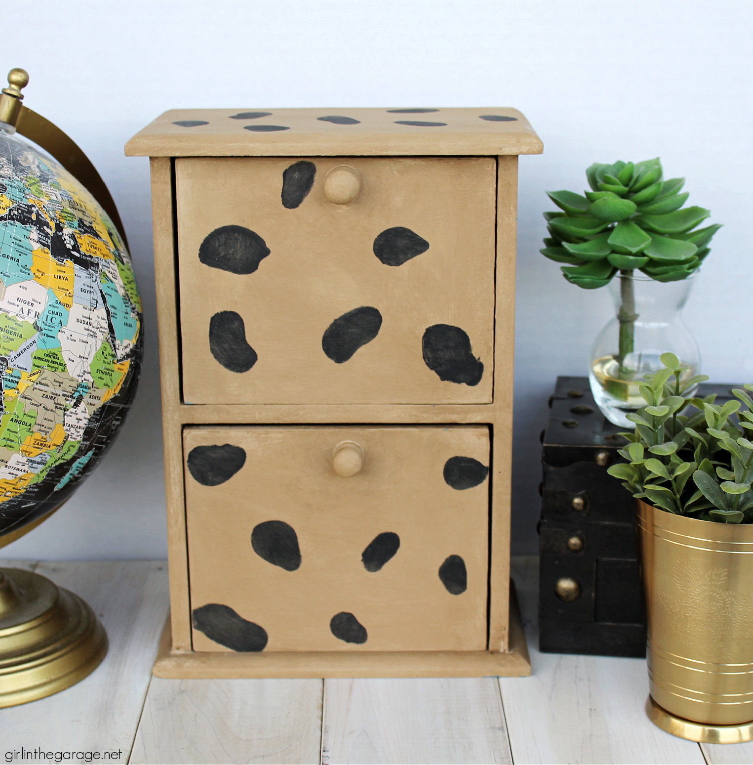 Learn how painting a cheetah print can transform a boring wooden box easily with the right technique. Use animal print to upcycle chic home decor. By Girl in the Garage