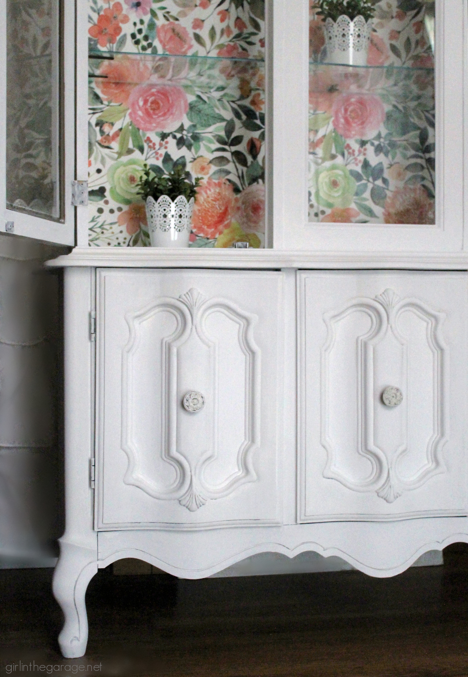 How to create a gorgeous painted china cabinet with wallpapered back. Full tutorial with photos by Girl in the Garage.