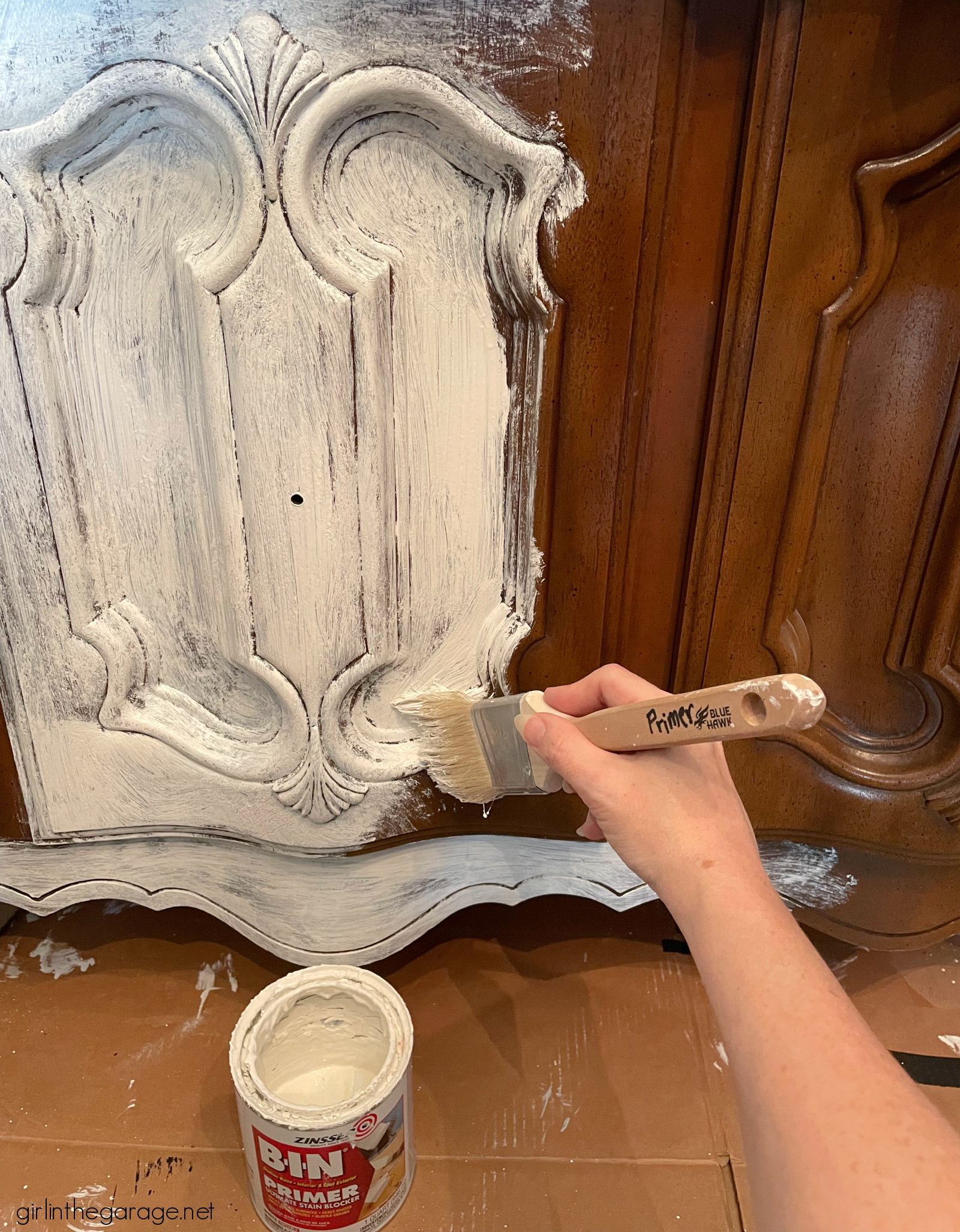 How to create a gorgeous painted china cabinet with wallpapered back. Full tutorial with photos by Girl in the Garage.