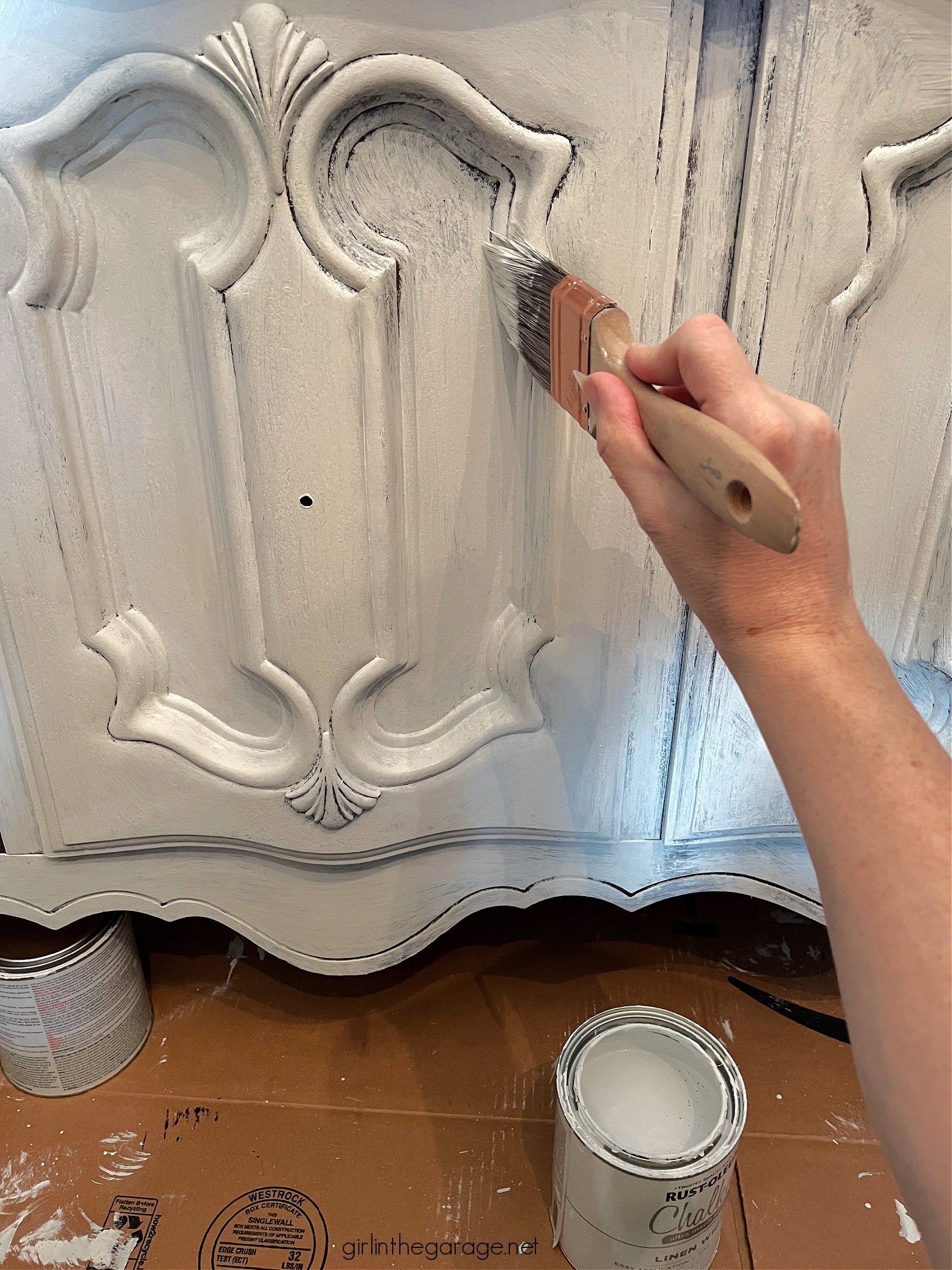 How to create a gorgeous painted china cabinet with wallpapered back. Full tutorial with photos by Girl in the Garage.