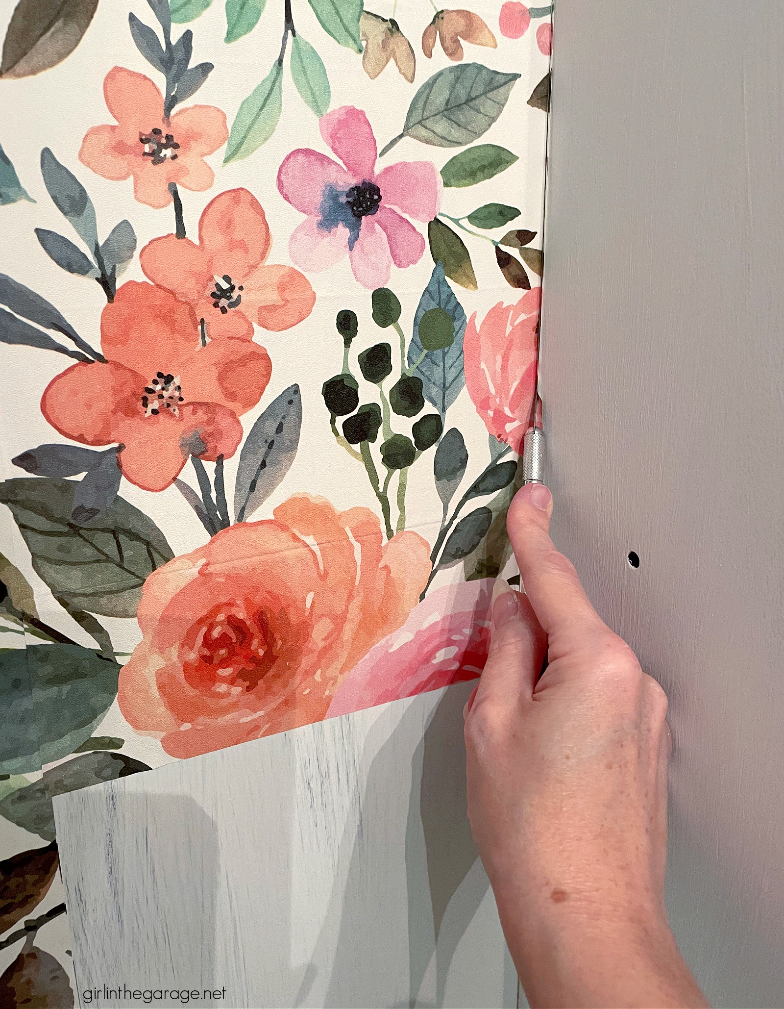 How to create a gorgeous painted china cabinet with wallpapered back. Full tutorial with photos by Girl in the Garage.