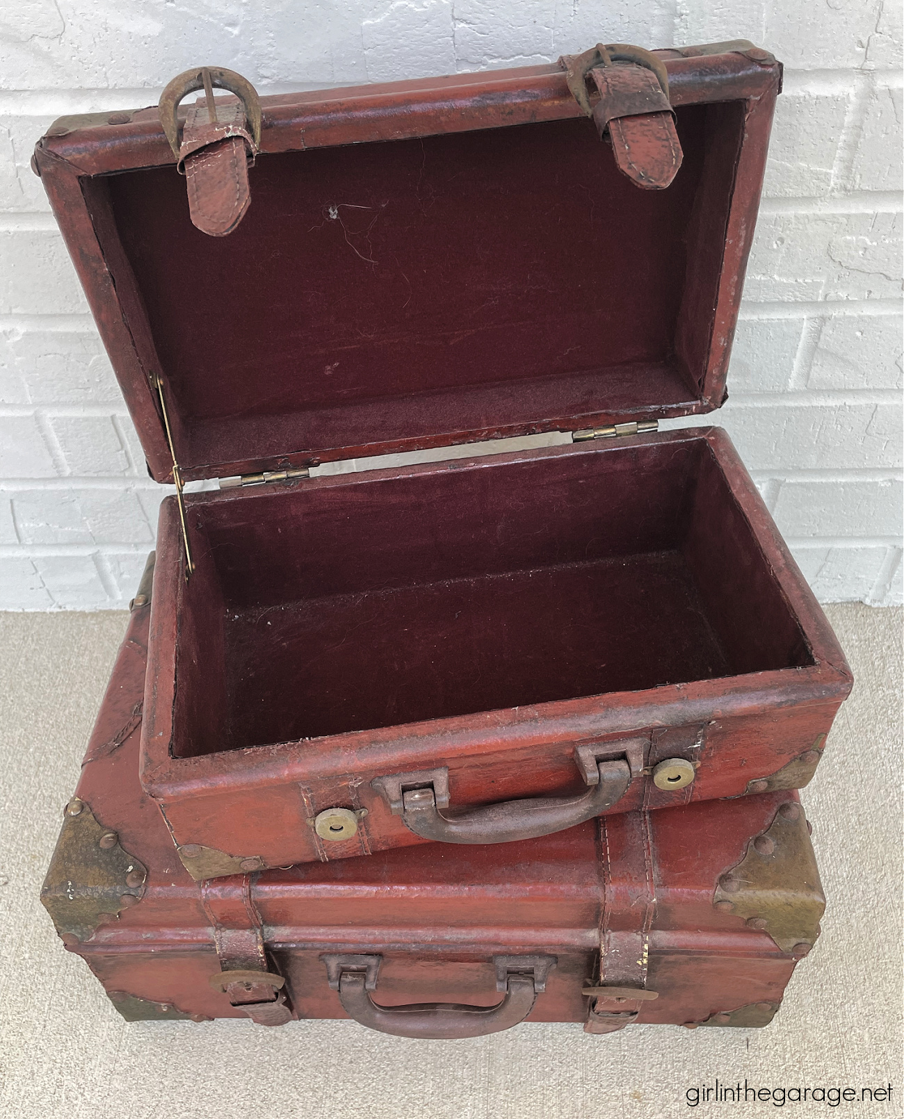 Learn how to paint a leather suitcase as beautiful custom decor for your home. Step by step painting tutorial by Girl in the Garage.