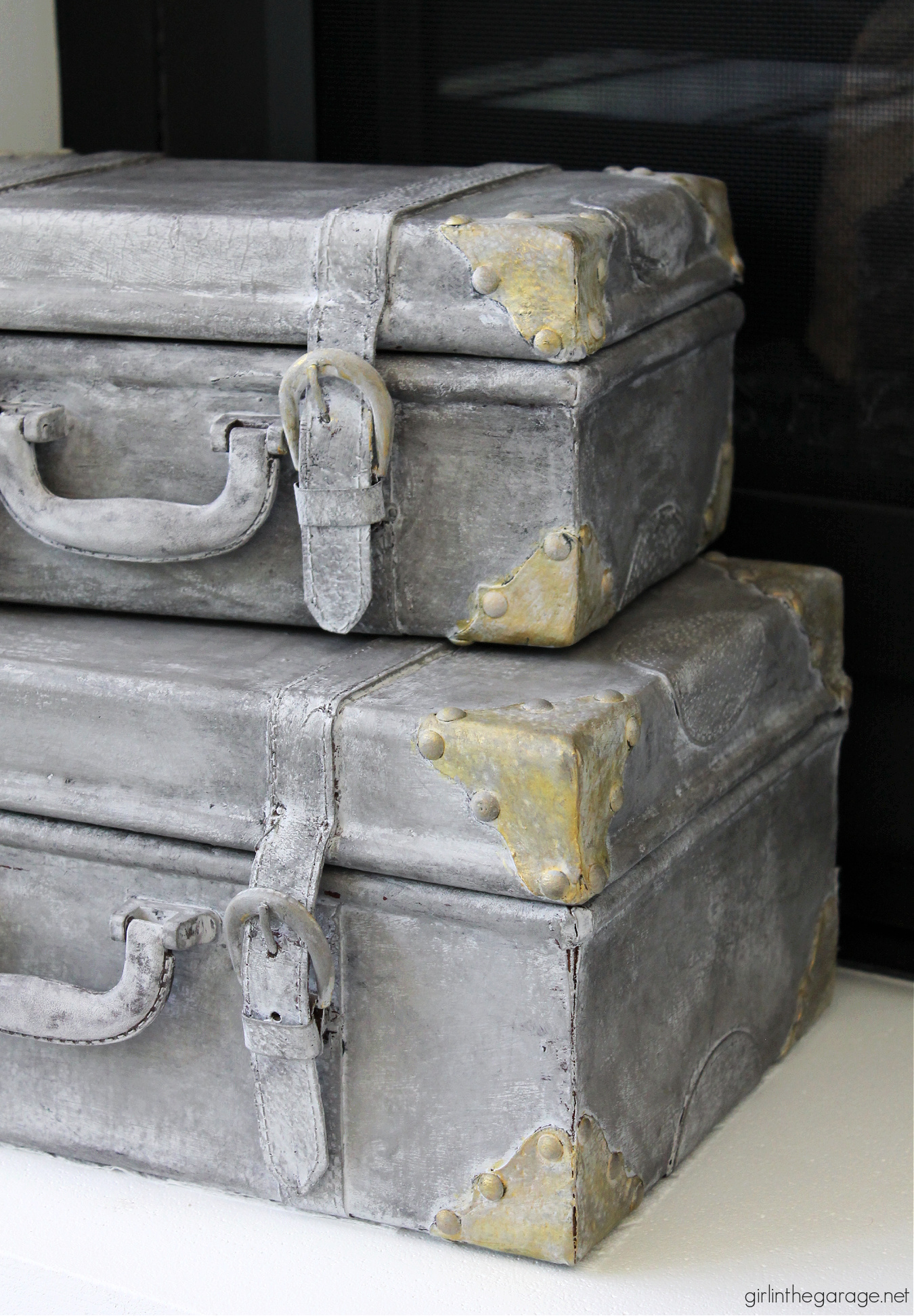 Learn how to paint a leather suitcase as beautiful custom decor for your home. Step by step painting tutorial by Girl in the Garage.
