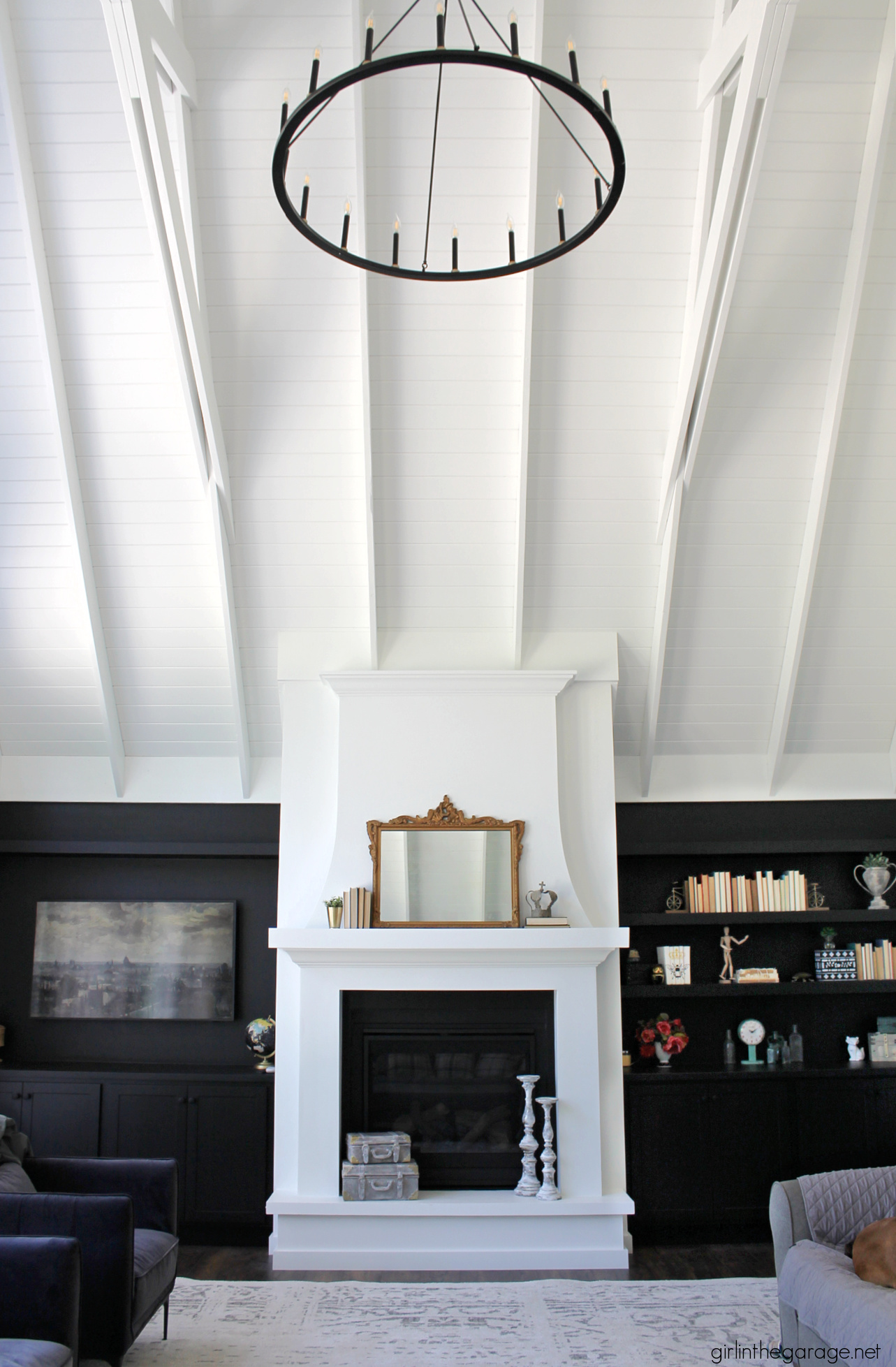 Transitional great room with vaulted ceiling and fireplace - Girl in the Garage