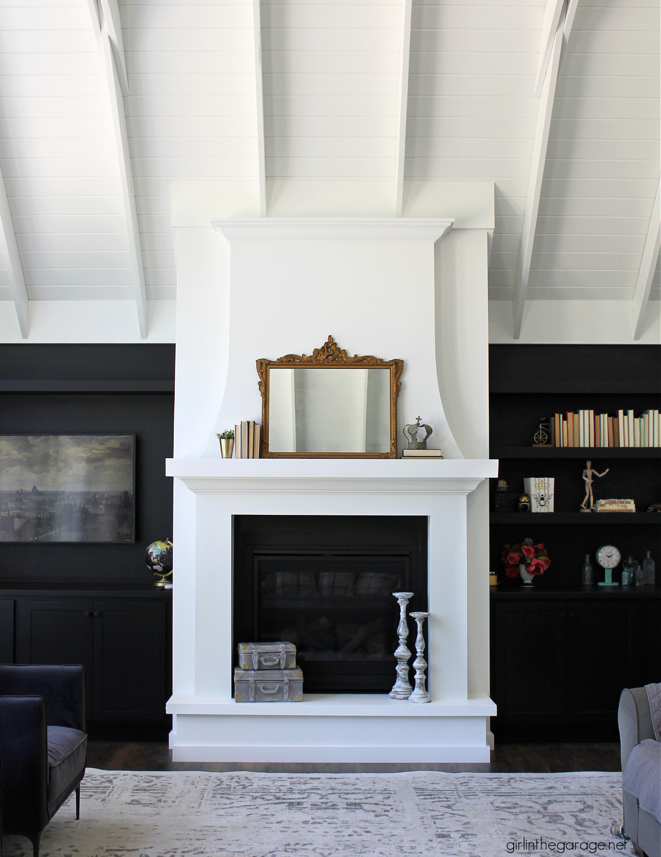 Transitional great room with vaulted ceiling and fireplace - Girl in the Garage