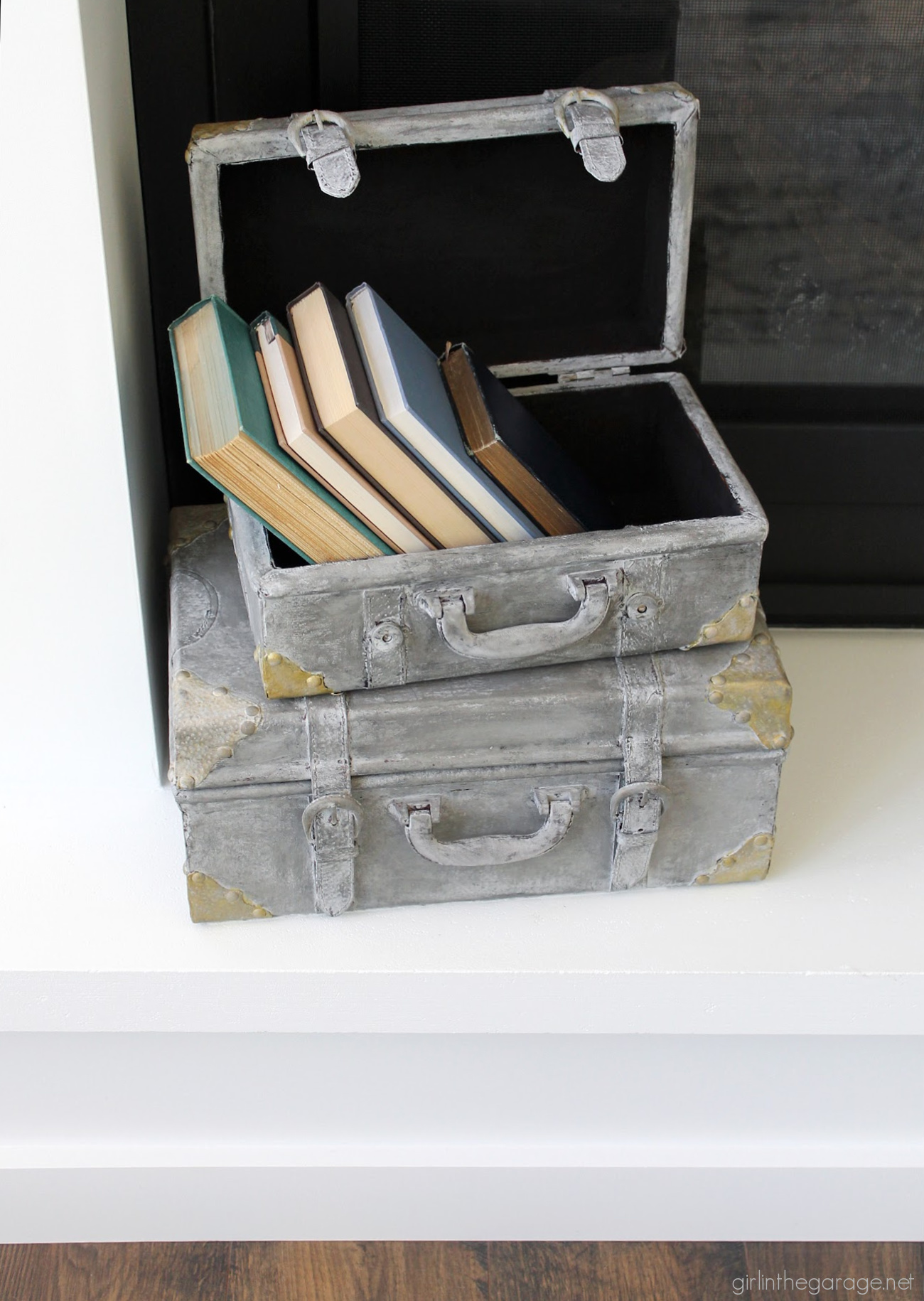 Learn how to paint a leather suitcase as beautiful custom decor for your home. Step by step painting tutorial by Girl in the Garage.