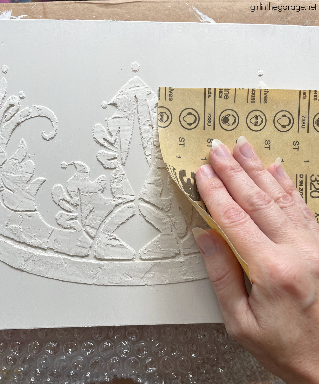 Learn how to paint a box and add a raised stencil for a stunning custom design. Step by step tutorial by Girl in the Garage.