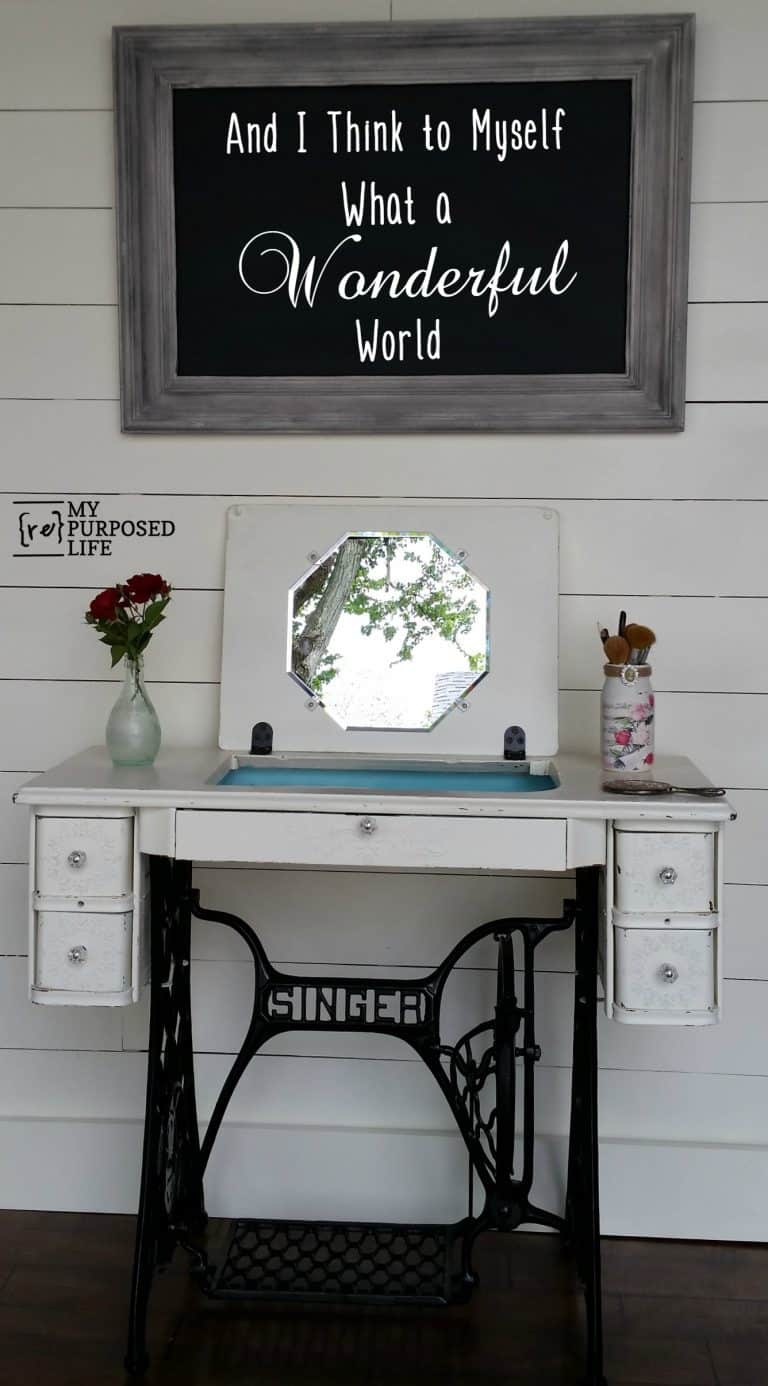 Antique Singer sewing table upcycled into mirrored vanity - by My Repurposed Life