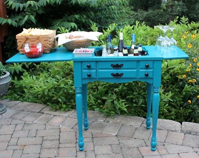 Learn how to upcycle a sewing cabinet into an outdoor bar area - by Sweet Pea
